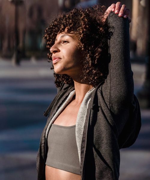 Energized person enjoying morning sun